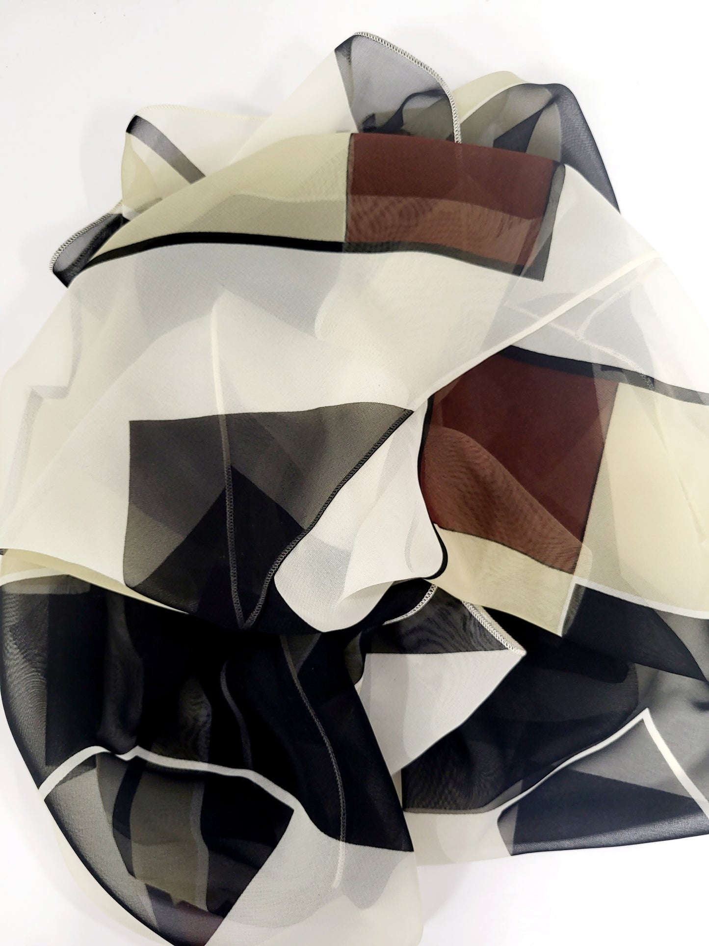 Geometric print circular scarf in earth tones and black