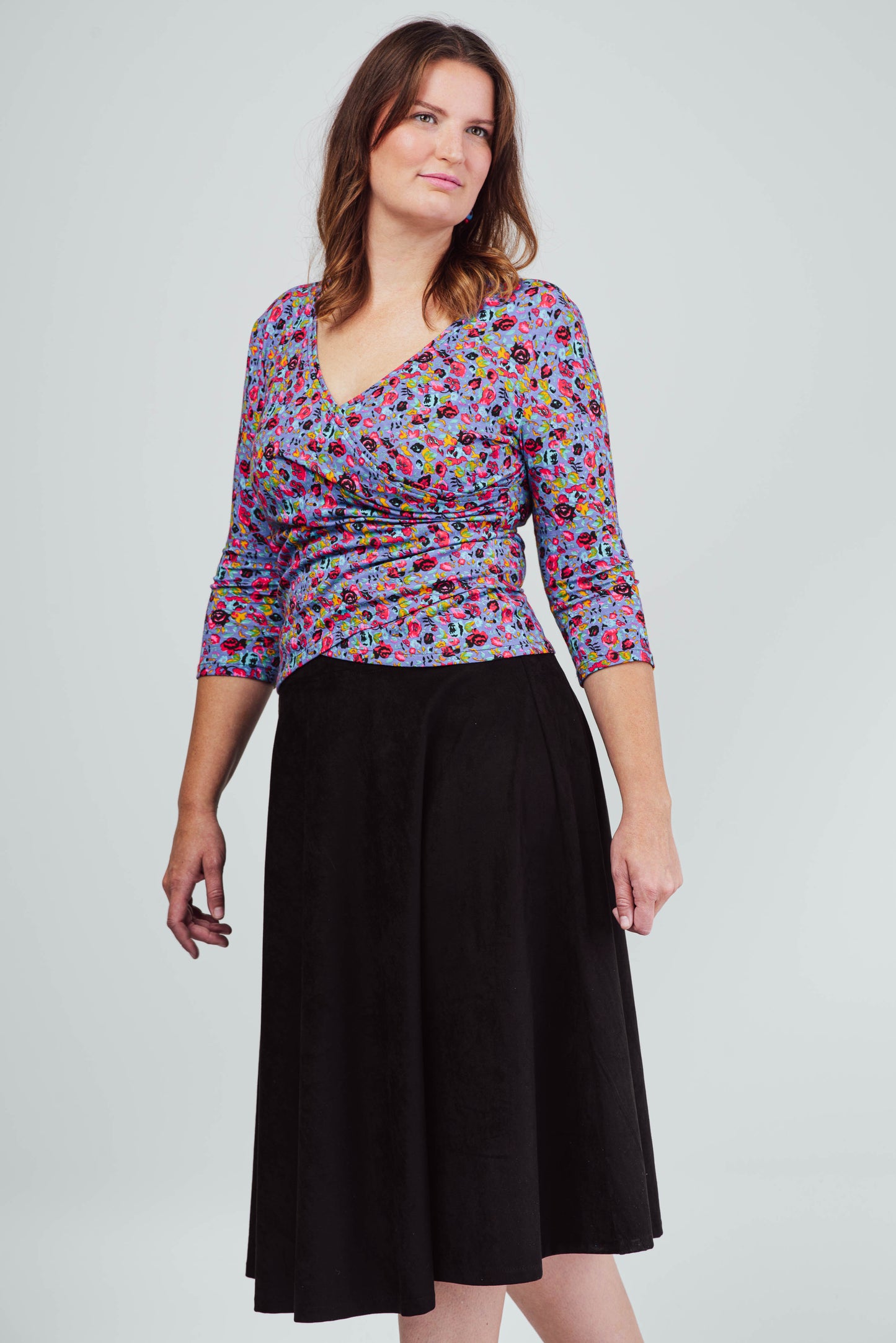 Mid-length flared skirt in caramel or black ultrasuede.