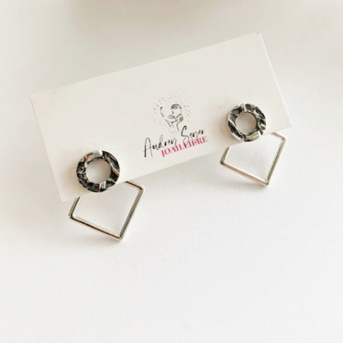 SEY - Sterling silver donut and diamond ear jackets.