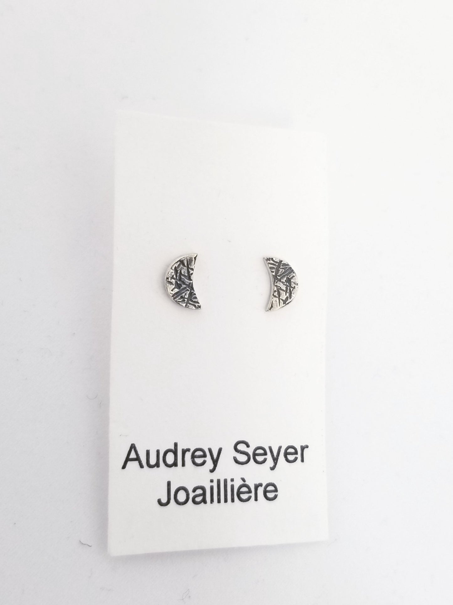 Small silver "moon" earrings