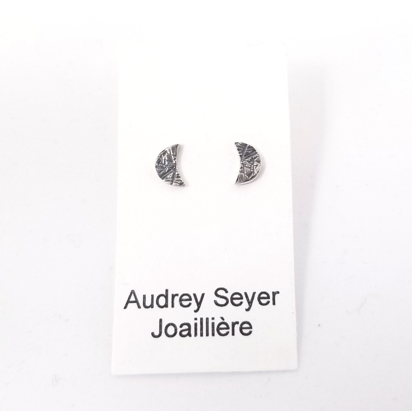 Small silver "moon" earrings
