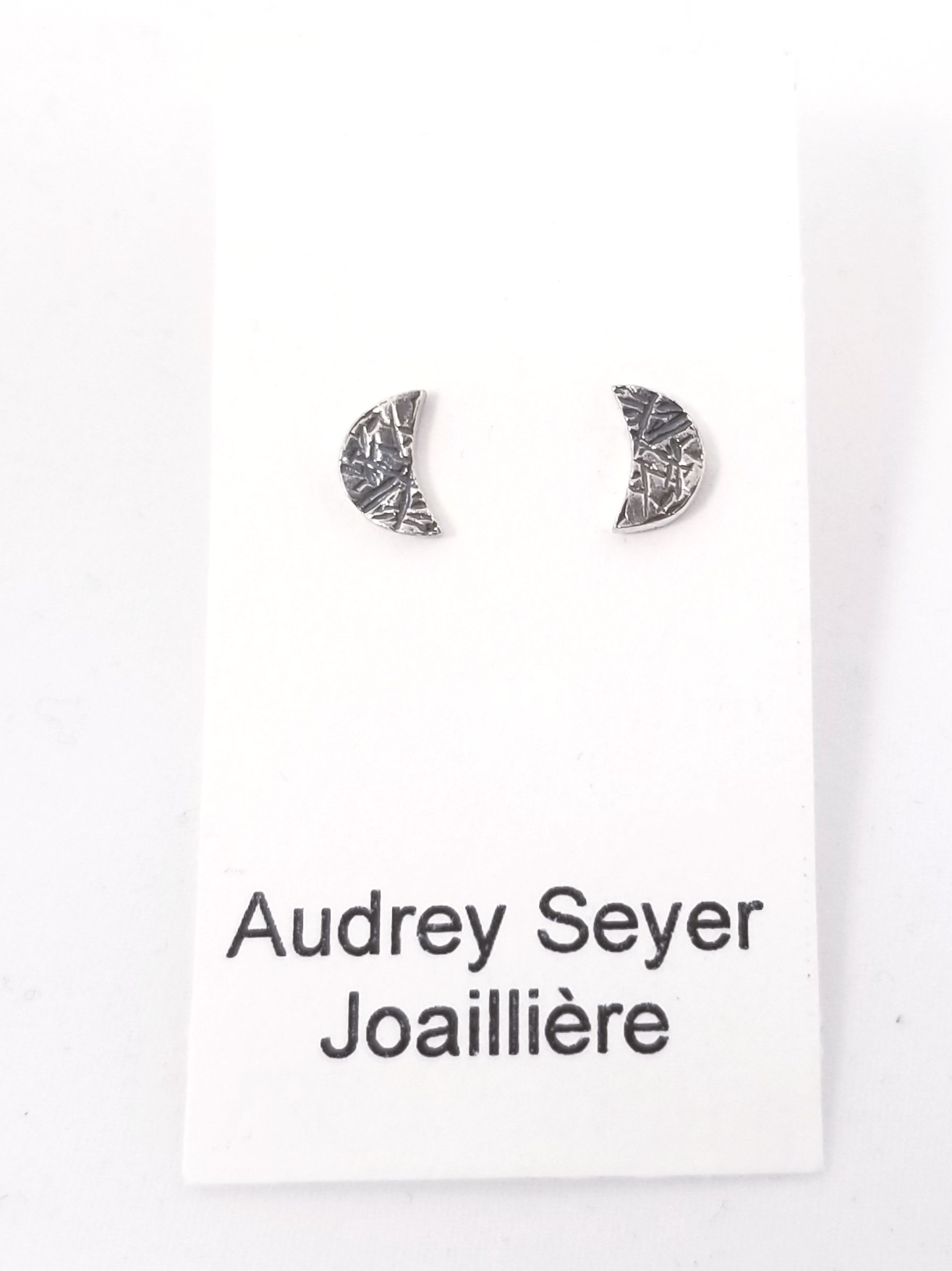 Small silver "moon" earrings