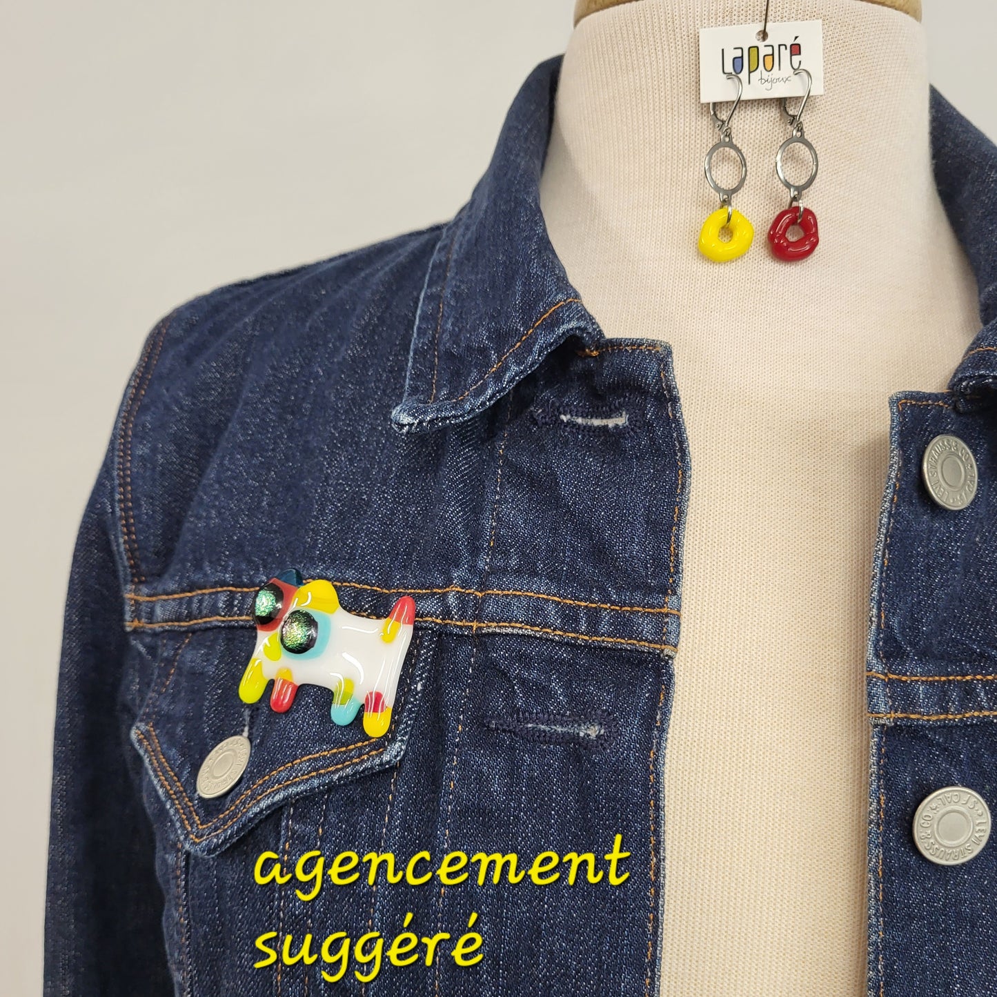 LAP - Fused glass earrings, one red and one yellow.