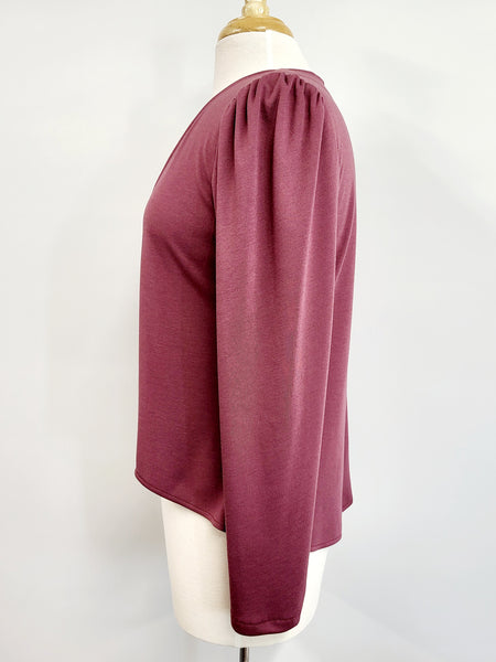 Twin-set en doux tricot rose antique.