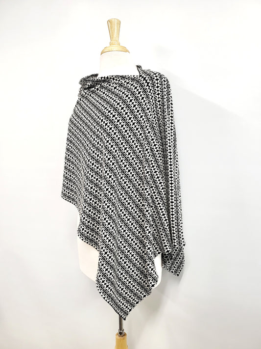 Poncho court asymétrique à motif blanc et noir
