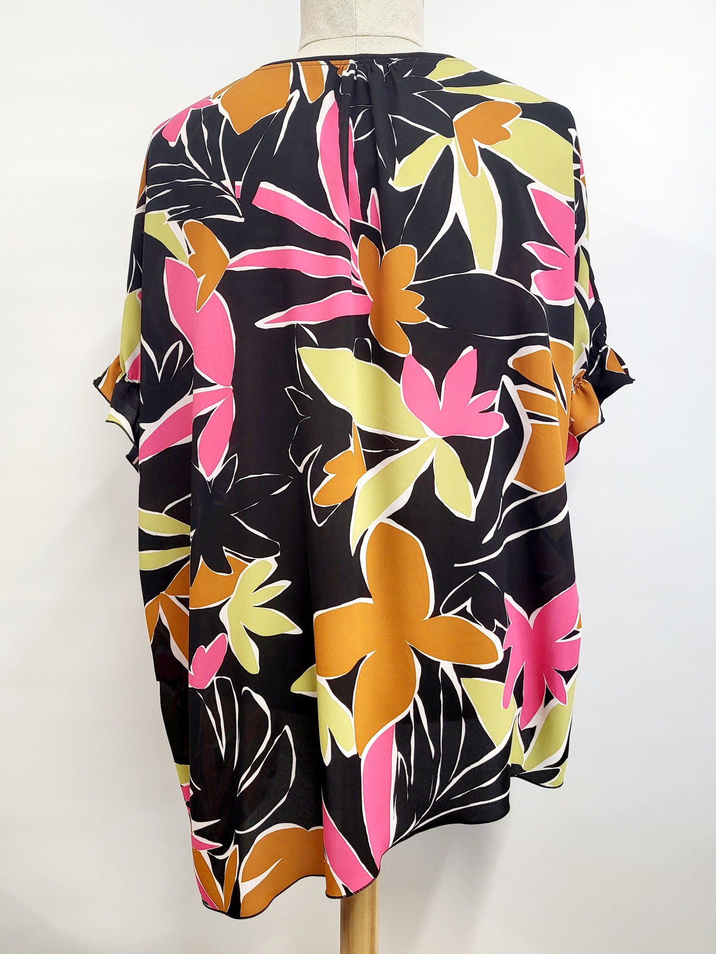 Asymmetrical Hélène tunic, tropical foliage print on a black background