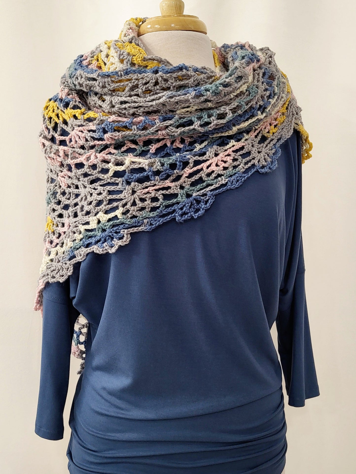 MPA - Crocheted triangular shawl, gray, blue, pink and yellow.