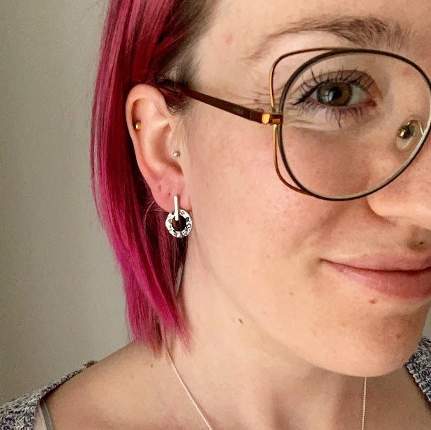 SEY - Silver earrings, donut and stick.