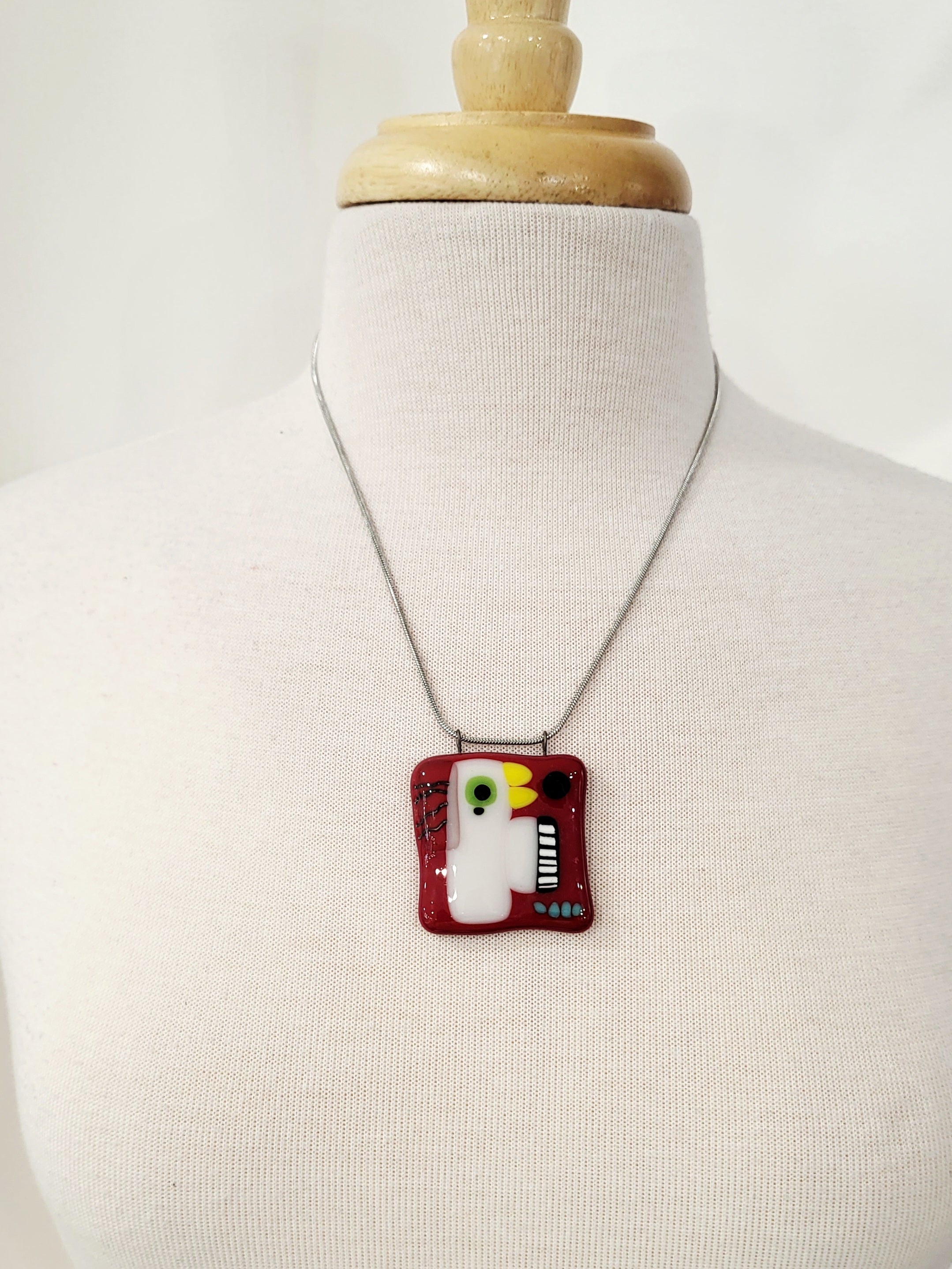 Forest green fused glass house-shaped necklace - Laparé jewelry.