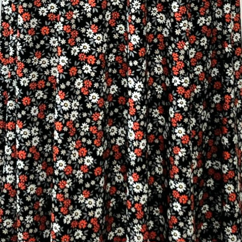 Mid-length flared skirt in printed electric blue.