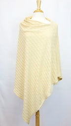 Poncho long et asymétrique en tricot de soie naturelle. - Christine Mercier atelier-boutique