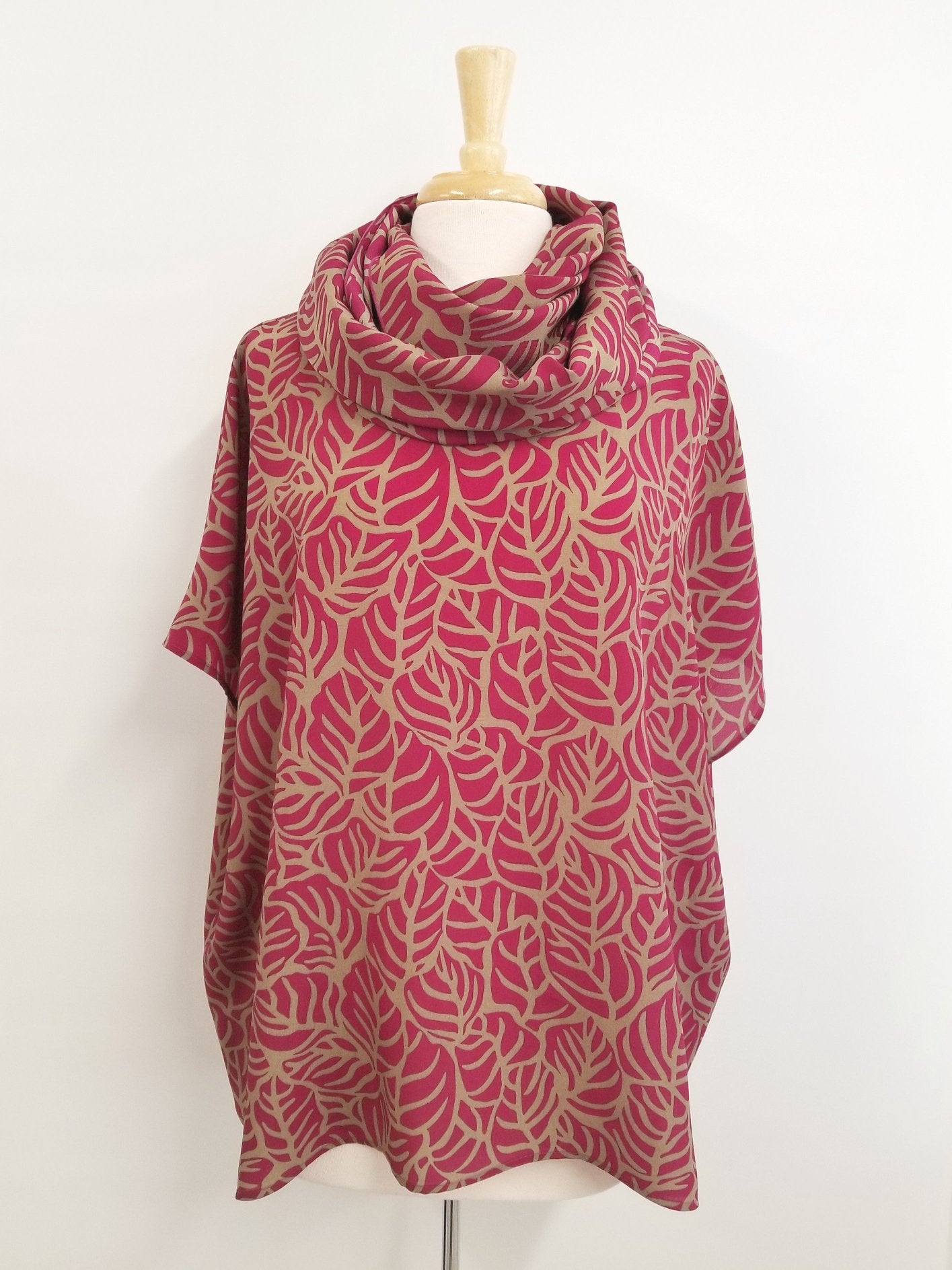 Loose and flowing tunic, magenta and beige foliage print.