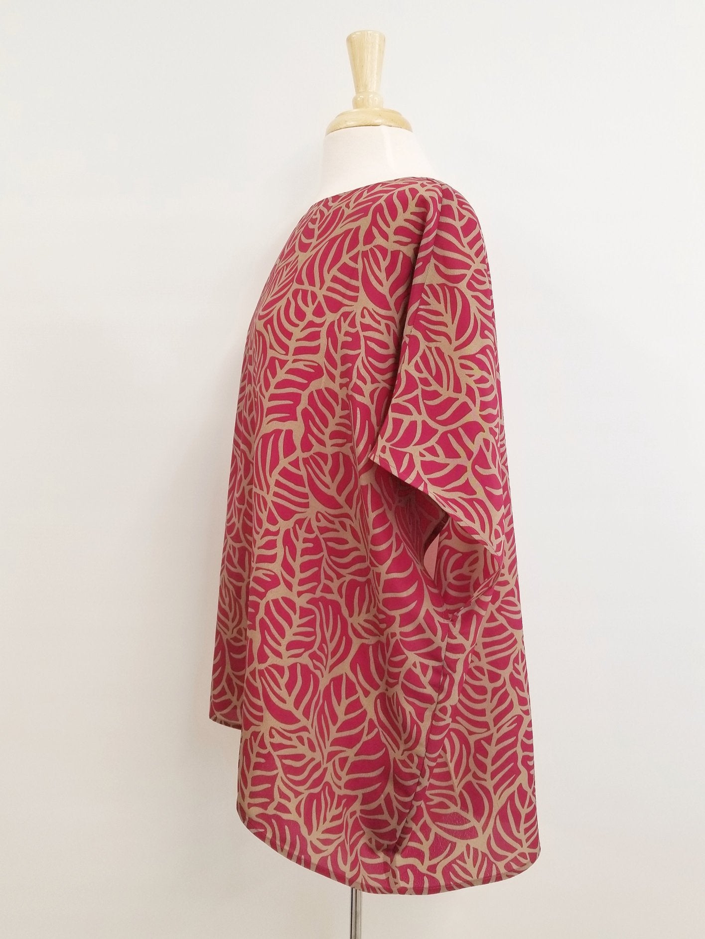 Loose and flowing tunic, magenta and beige foliage print.