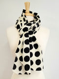 Long silk scarf, black polka dot print on an ecru background.